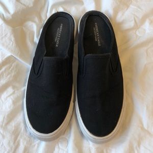 Black AE slide sneakers